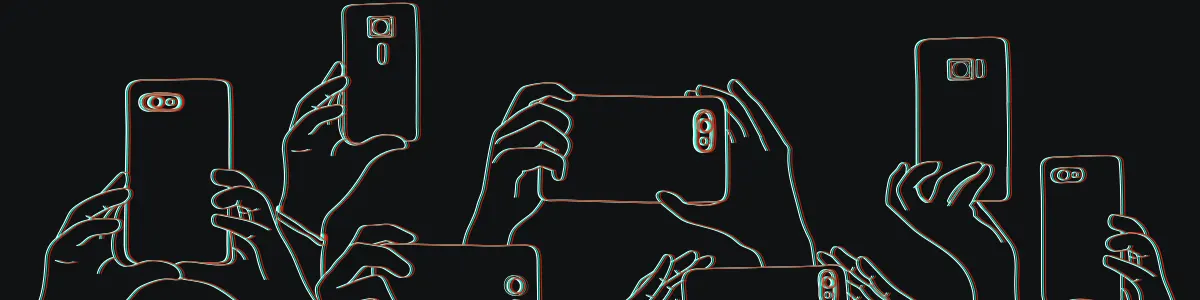 Hands holding TikTok mobile phones